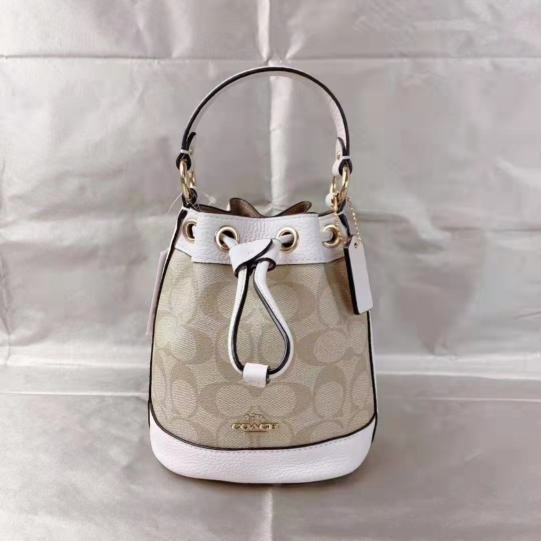 Coach C5121 Dempsey Drawstring Bucket 15 In Signature Canvas In Light Khaki Chalk Coach C5121 Dempsey Drawstring Bucket 15 In Signature Canvas In Light Khaki Chalk
